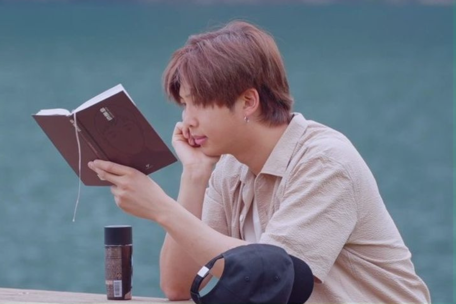 BTS RM reading a book